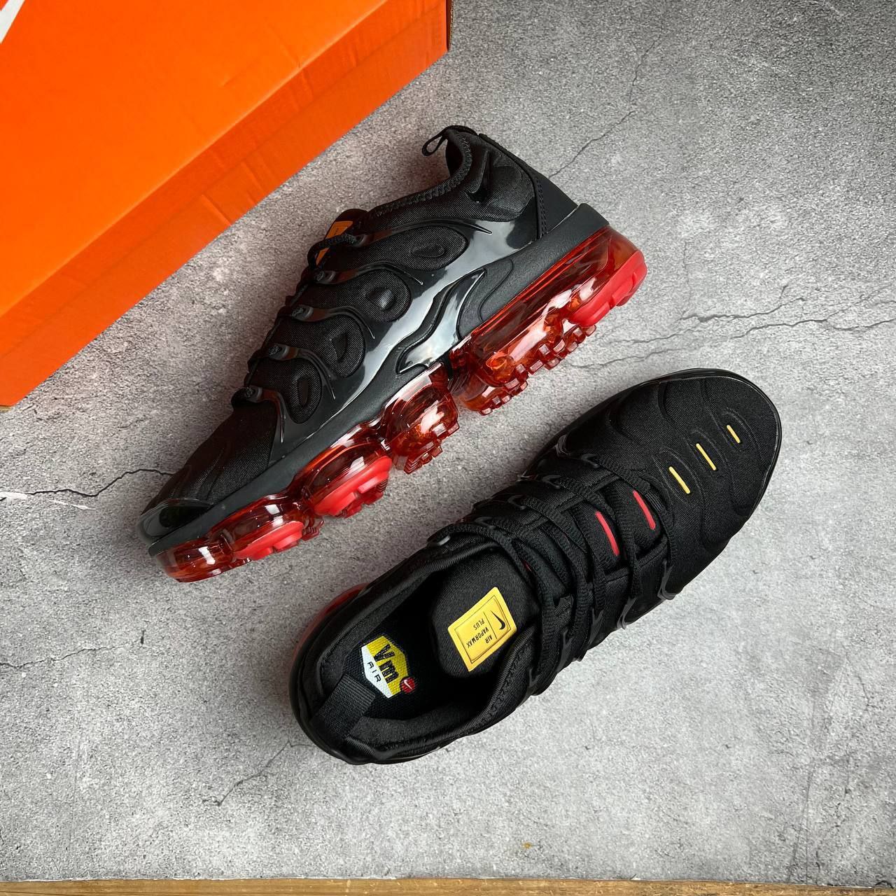 Nike Air Vapormax Plus With Red and Orange Accents